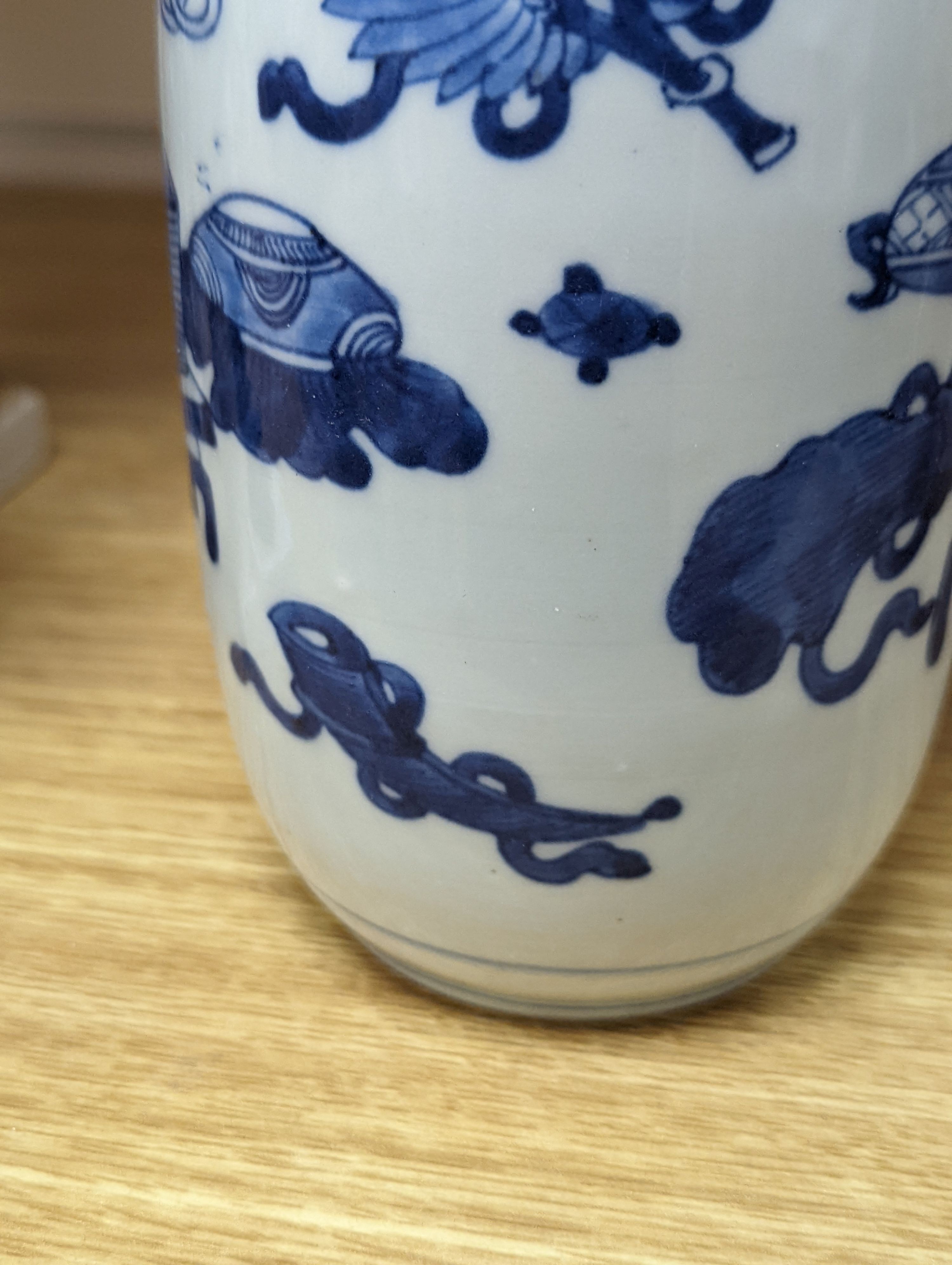 A Chinese blue and white ‘Antiques’ vase, 19.5 cms high.